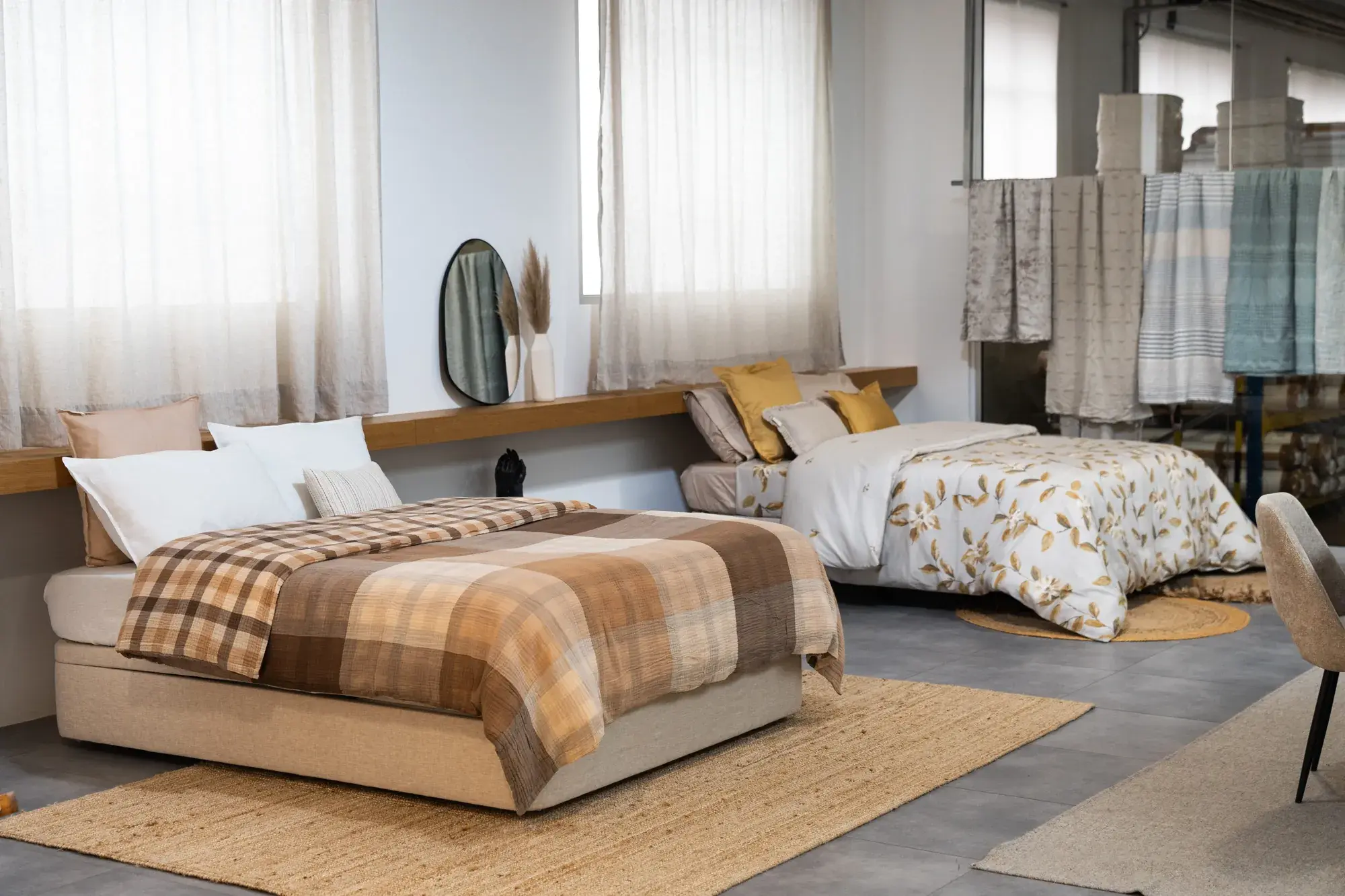 RIFER showroom with dressed beds