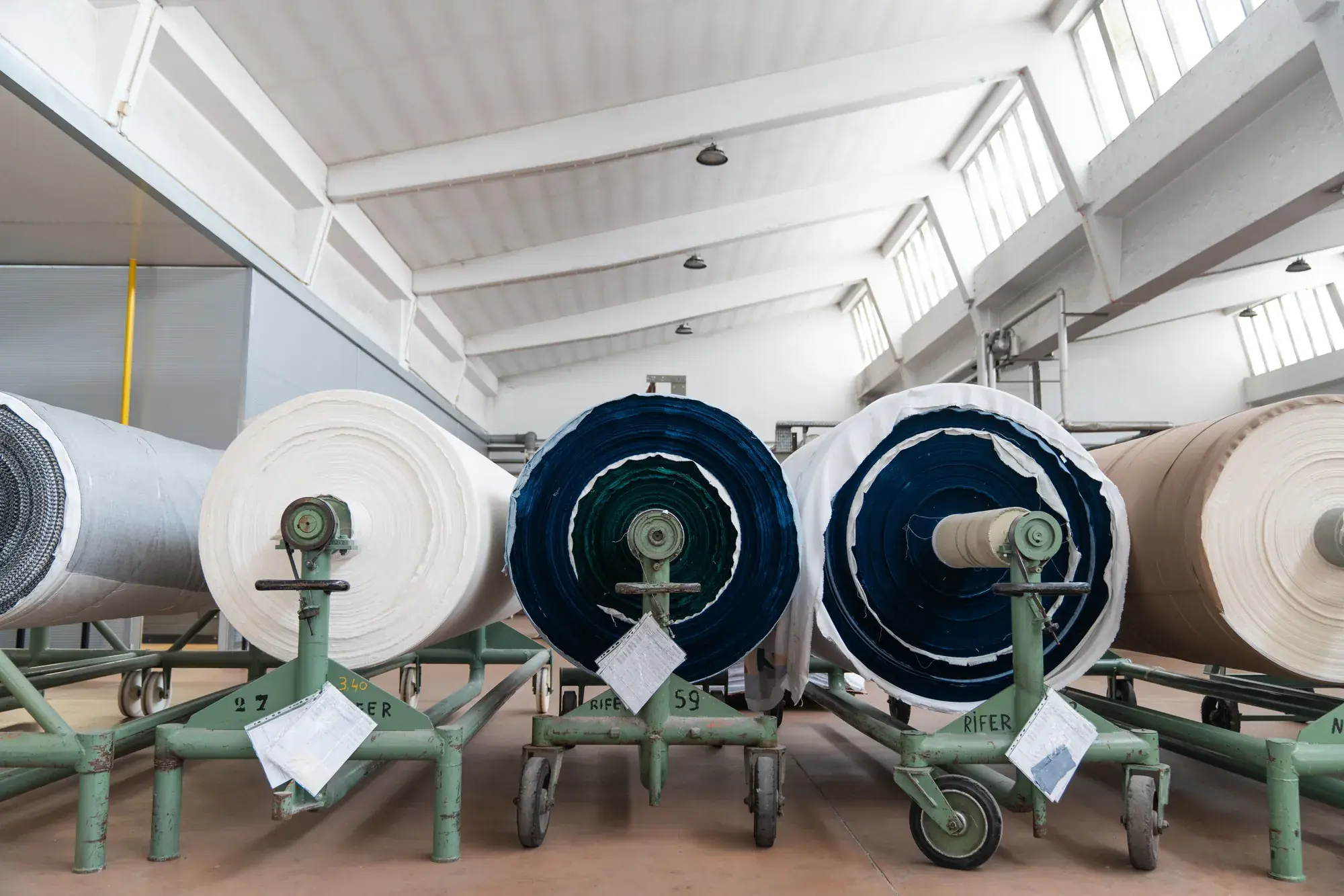 Rolls of finished textile in the RIFER warehouse